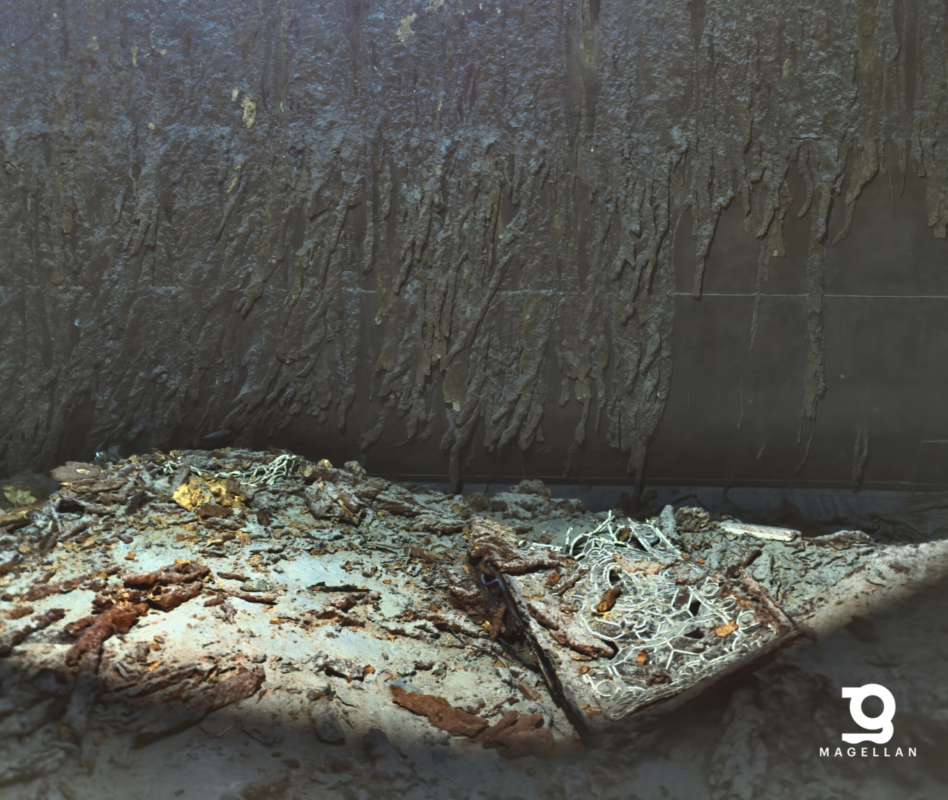 Titanic underwater still image - shows the shipwreck, with the broken glass from the window panels visible on the seafloor. Captured with the Voyis Observer Imaging System